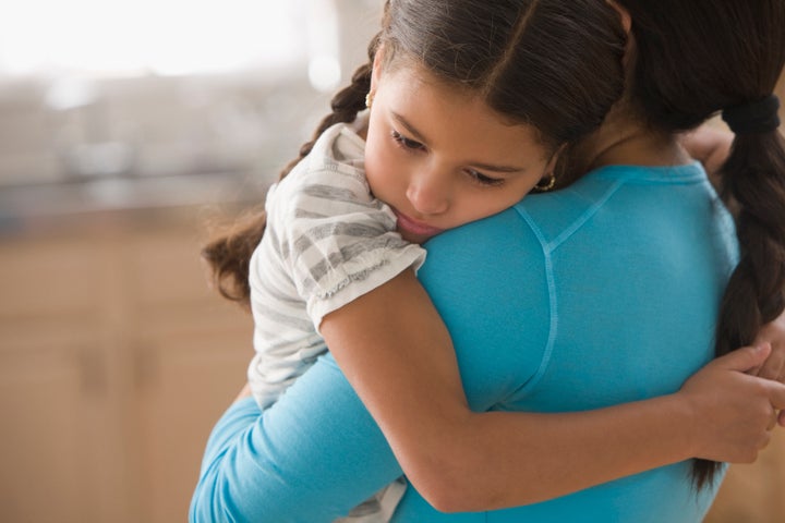 Part of reassuring kids is offering a little TLC.
