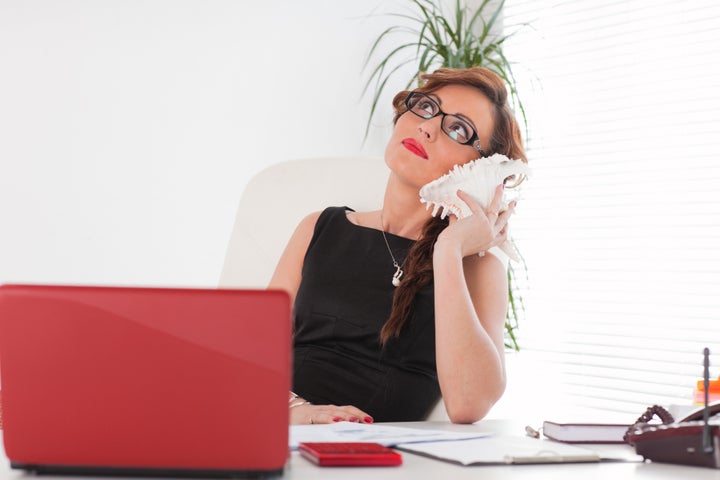 young businesswoman rests at...