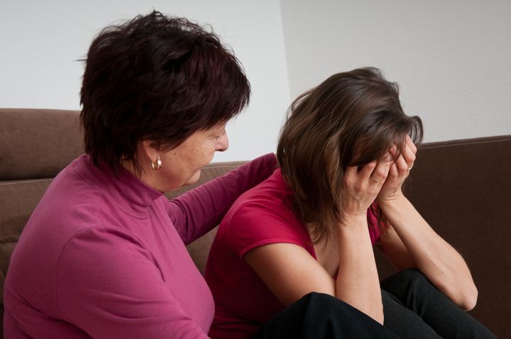 Problems - senior mother comforts daughter