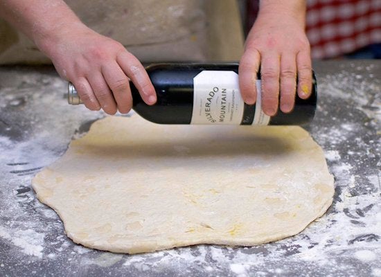 A Wine Bottle As Rolling Pin