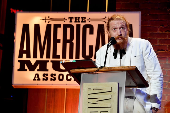 Tyler Childers receives an award at the 2018 Americana Music Awards at the Ryman Auditorium in Nashville on Wednesday.