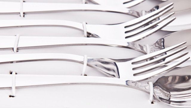 Close up of flatware isolated on white background