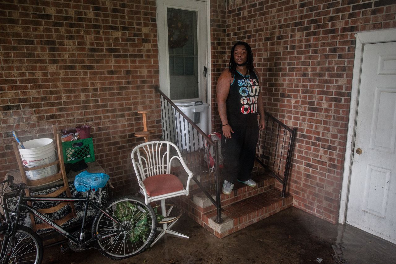 Sharon Langley returned home to gather a few belongings after being evacuated as floodwaters rose early in the morning from his home in Washington, North Carolina.