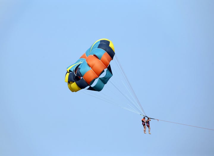 photo of a parachute with two...