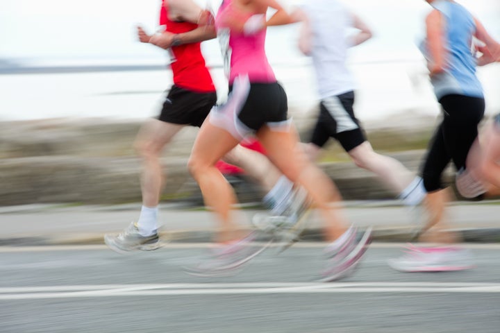 group of runners compete in the ...