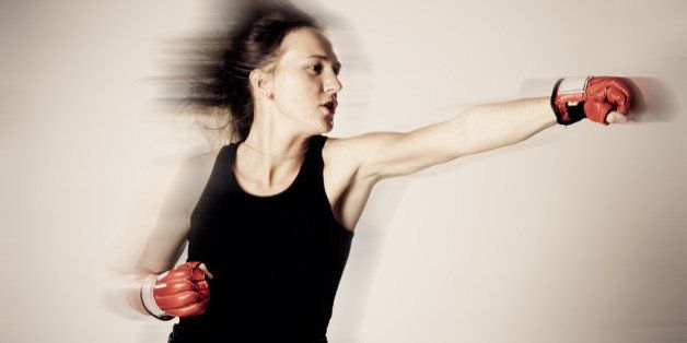 beautiful girl with boxing...