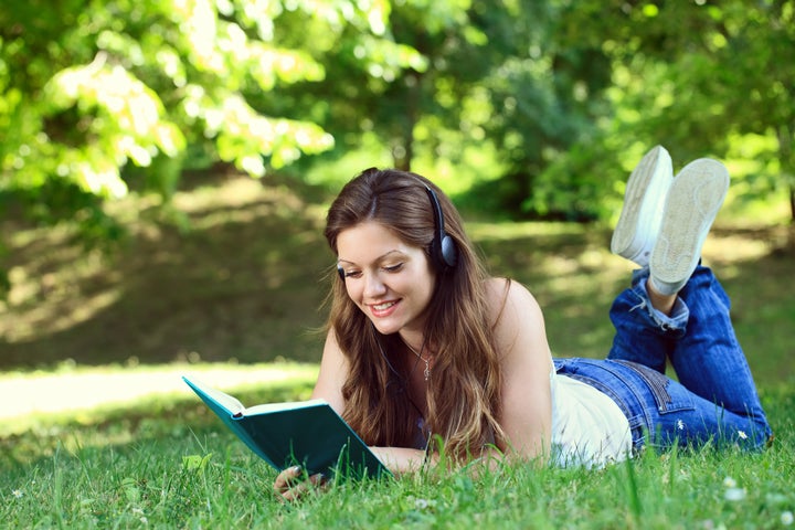 young woman listening music...