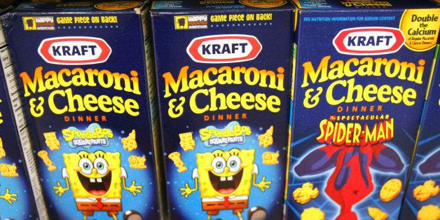 Boxes of Kraft Foods Inc. Macaroni & Cheese sit on a shelf in a grocery store in Glenview, Illinois, U.S., on Tuesday, Jan. 19, 2010. Cadbury Plc agreed to an improved 11.9 billion-pound ($19.7 billion) offer from Kraft Foods Inc., ending more than four months of resistance and creating the world's largest confectioner. Photographer: Tim Boyle/Bloomberg via Getty Images News