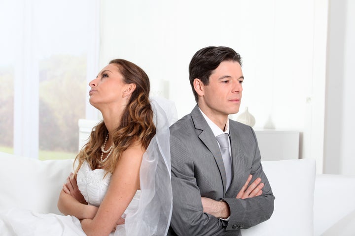 Bride and groom being mad at each other