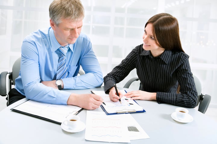 Business man and woman in a meeting