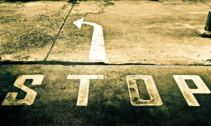 sepia of directional street sign