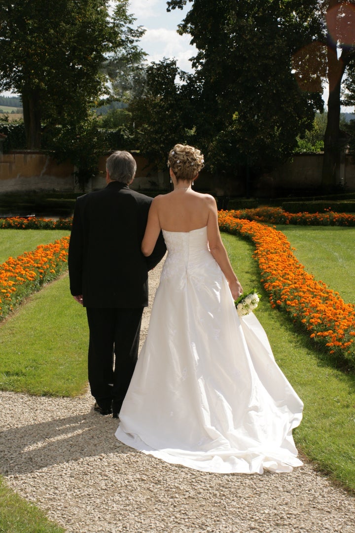 Bride and groom in a park