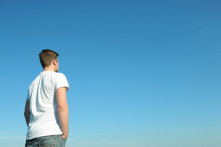 young man in white t shirt...