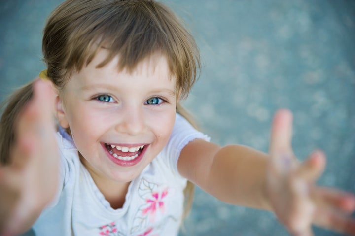 Portrait of a happy liitle girl close-up