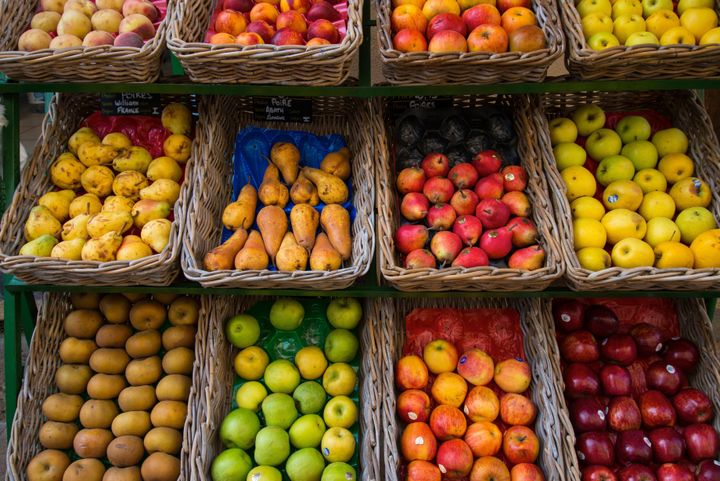 fruits in baskets on market...