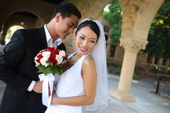 A beautiful bride and handsome groom at church during wedding