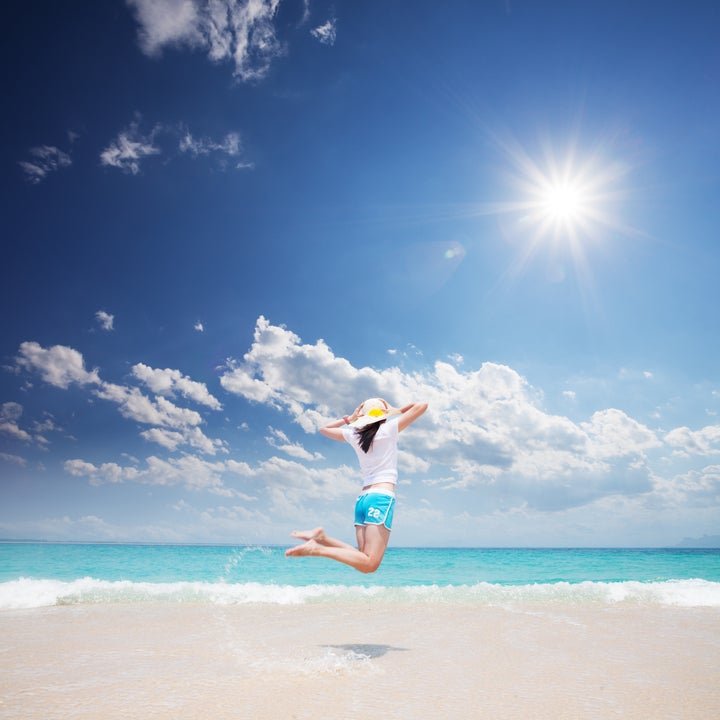 girl standing on beach