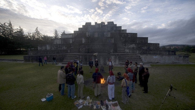 Indigenous priests take part in a Mayan ceremony at the Zaculeu archaeological site, in the Huehuetenango department, 270 km west of Guatemala City on July 21, 2012, before receiving the 'Oxlajuj B'aktun' which ends on December 21, when the current Mayan cycle known as Bactum 13, which for some experts will coincide with the end of the world. AFP PHOTO / Johan ORDONEZ (Photo credit should read JOHAN ORDONEZ/AFP/GettyImages)