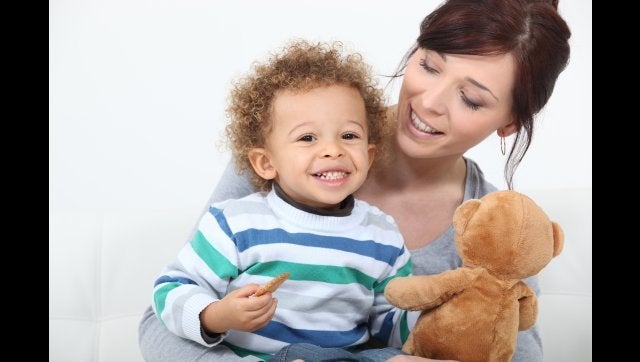 Woman playing with her child