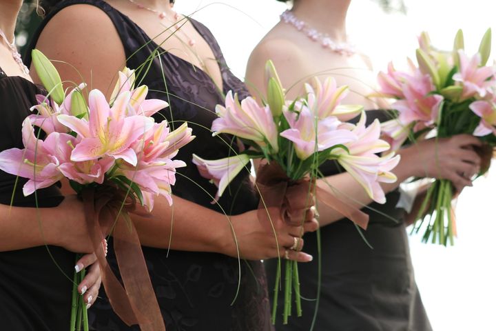 bridesmaids standing at ceremony