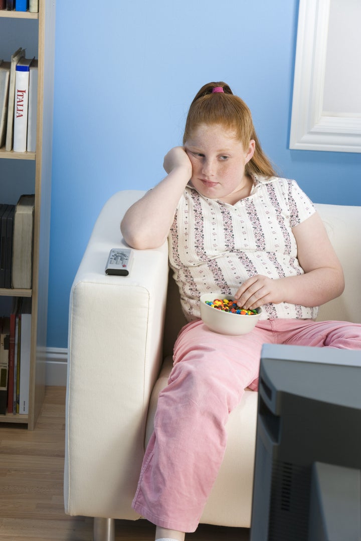 Teenage Girl Sitting Watching TV