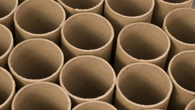 Cardboard Mailing Tubes in a Row.