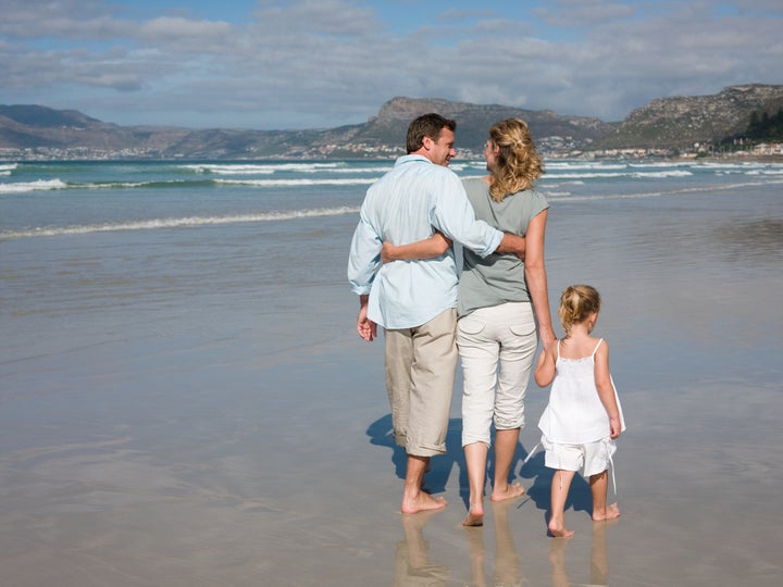 Family walking by the sea - IE397-087