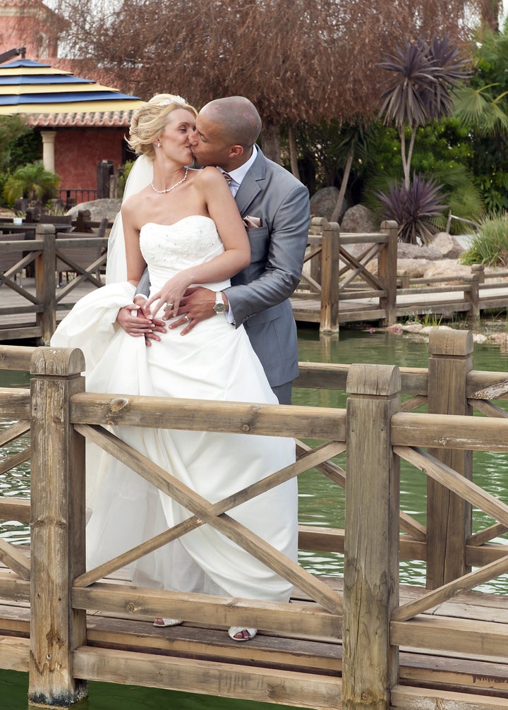 Bride and Groom enjoying a moment together kissing