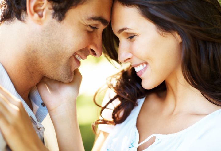 Closeup portrait of smiling young couple in love - Outdoors
