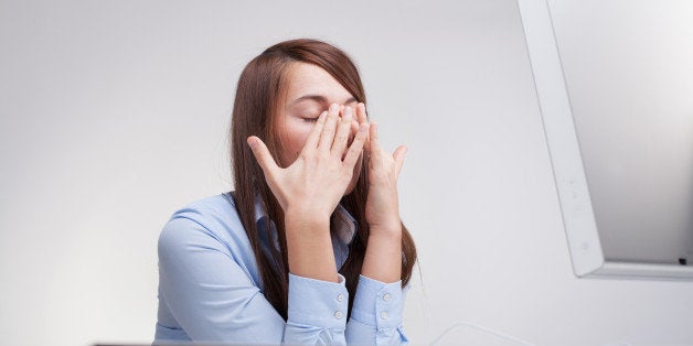 beautiful woman tired at work