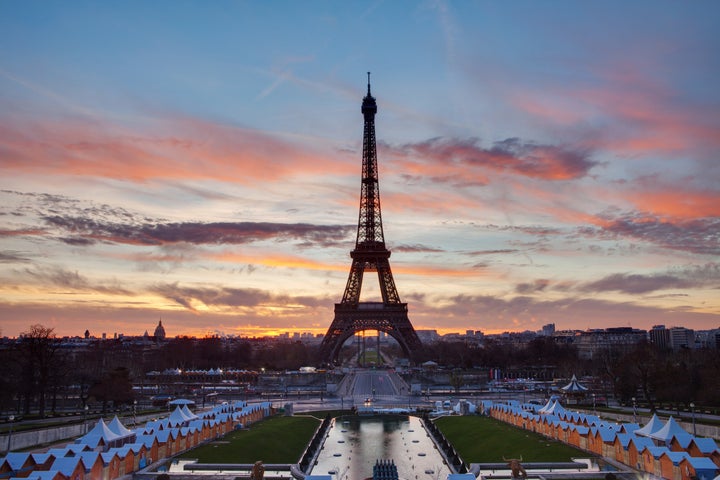 eiffel tower with red clouds...