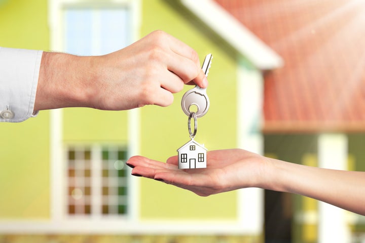 Handing Over the Key from a New Home