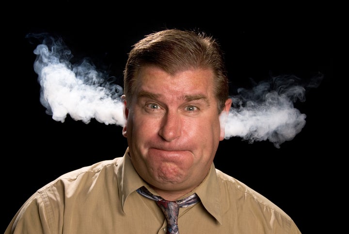 A man is angry and venting smoke from his ears in a classic expression shared in illustrations and cartoons.