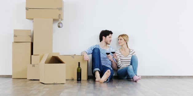 happy Young couple moving in new house