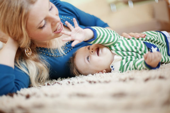 Mother with her baby at home