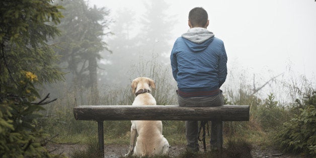 Lost man with his dog in mountain.