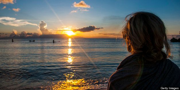 Woman watching the sunset in Guam, US Territory, Central Pacific, Pacific
