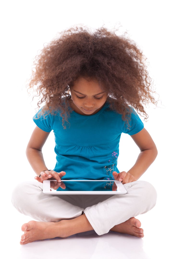 little african asian girl using ...