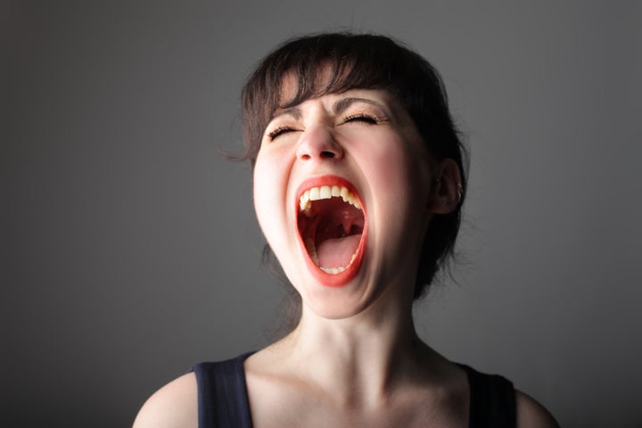 portrait of pretty girl shouting