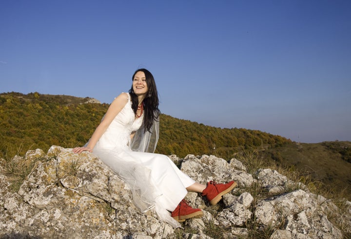 beautiful bride posing on rocks ...