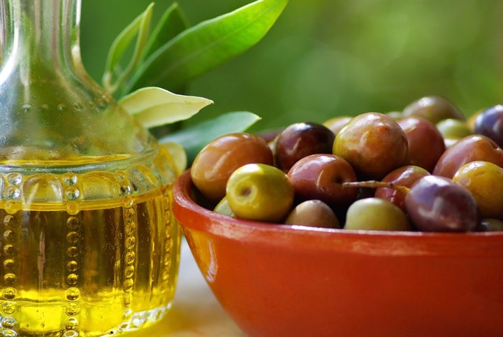 Olive oil and mature olives.