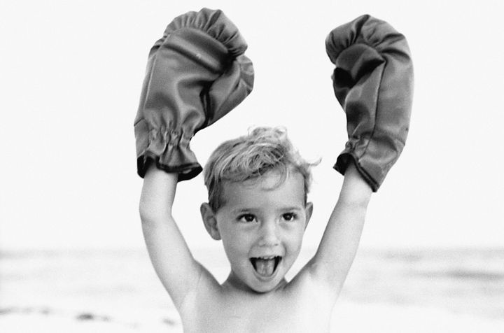 Boy with boxing gloves