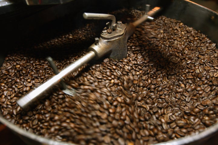 BERLIN, GERMANY - JANUARY 24: Freshly-roasted espresso coffee beans cool in a refurbished 1918 Probat coffee bean roaster at Bonanza Coffee Roasters on January 24, 2011 in Berlin, Germany. Bonanza founder Kiduk Reus is among a growing number of so-called third wave artisinal coffee bean roasters who are finding a niche market in Europe and the USA for their carefully-crafted and expensive coffee. Reus insists that the cast iron parts, the slow-roasting abilities and hands-on controls of his flame-roasting Probat machine allow him to develop the most flavour from his carefully selected beans. (Photo by Sean Gallup/Getty Images)