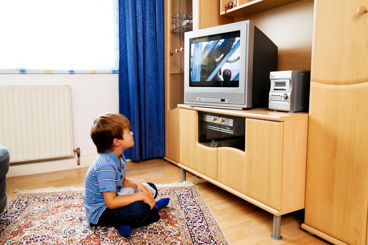 a small child watching...