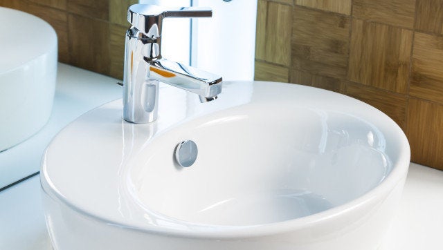 Modern bathroom sink in white ceramic