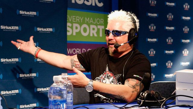 NEW ORLEANS, LA - FEBRUARY 01: TV personality Guy Fieri attends SiriusXM's Live Broadcast from Radio Row during Bowl XLVII week on February 1, 2013 in New Orleans, Louisiana. (Photo by Cindy Ord/Getty Images for Sirius)