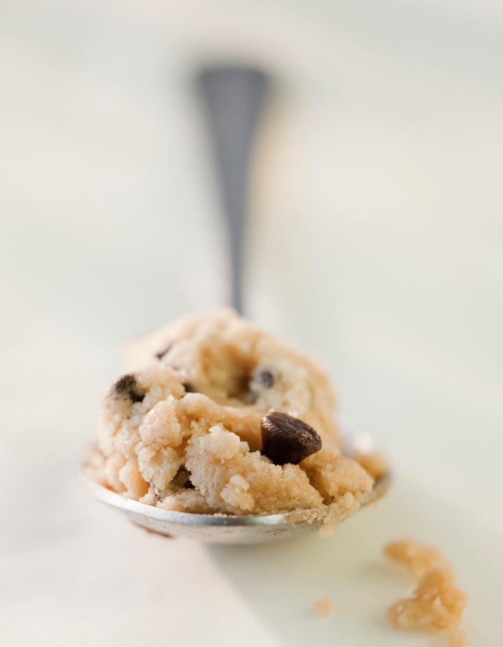 Chocolate chip cookie dough on a spoon