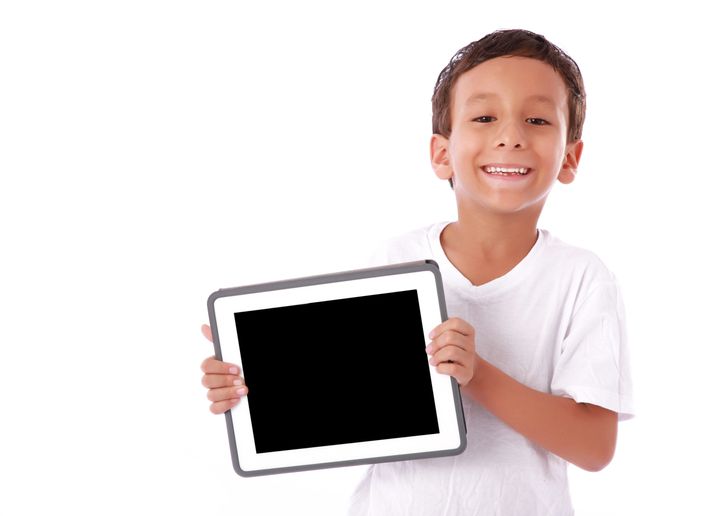 boy showing a tablet isolated...