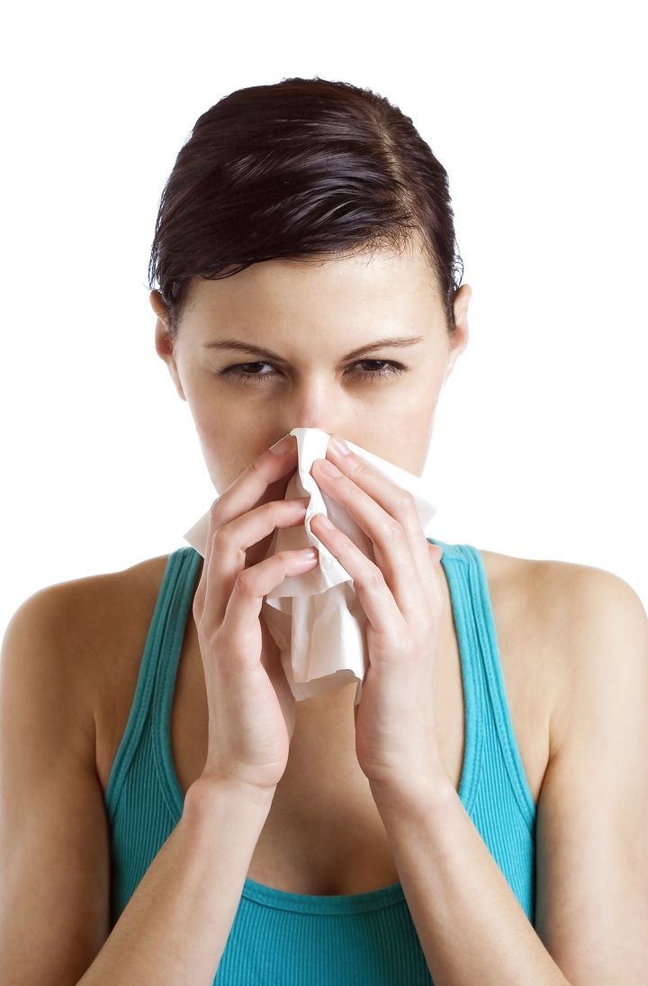 sneeze ill woman