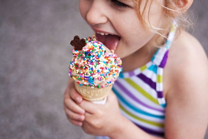 Ice cream with sprinkles, ice cream cone, summer treats, little girl.